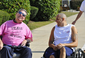 Ralph Villers (left) has fun with top individual fund raiser Robert "RJ" Alling (rigiht) at the 2014 Wheel-A-Thon.